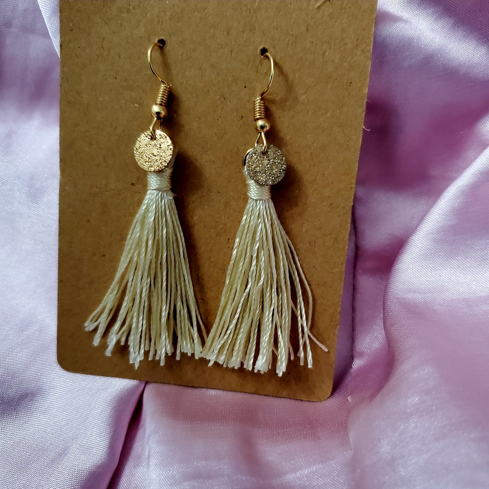 Elegant Gold and Cream Tassel Earrings